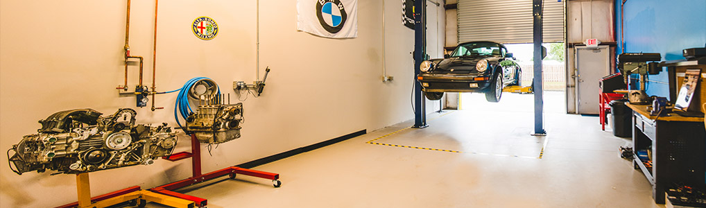 porsche lifted up in the shop ready to work on